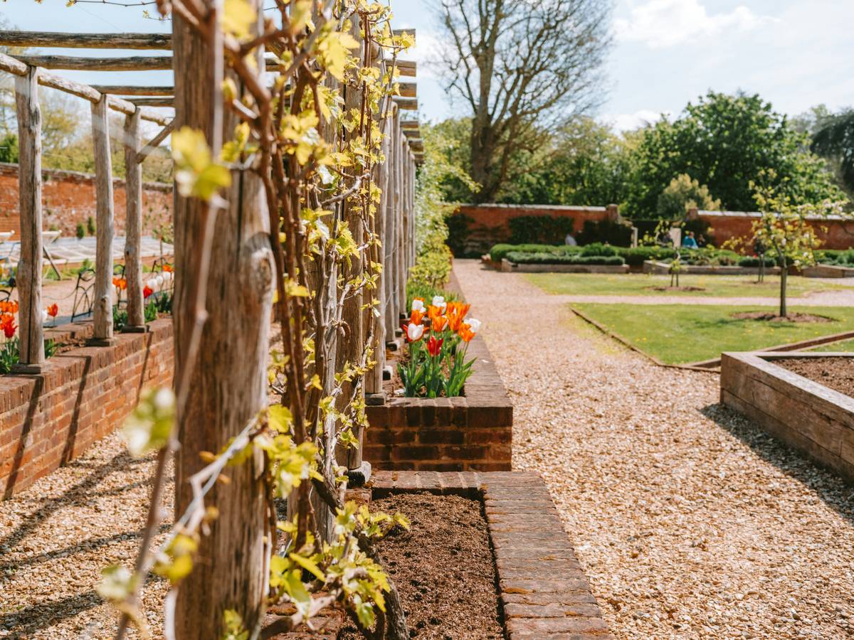 how to use gravel for landscaping with proper edging and fabric under angular crushed stone pathway